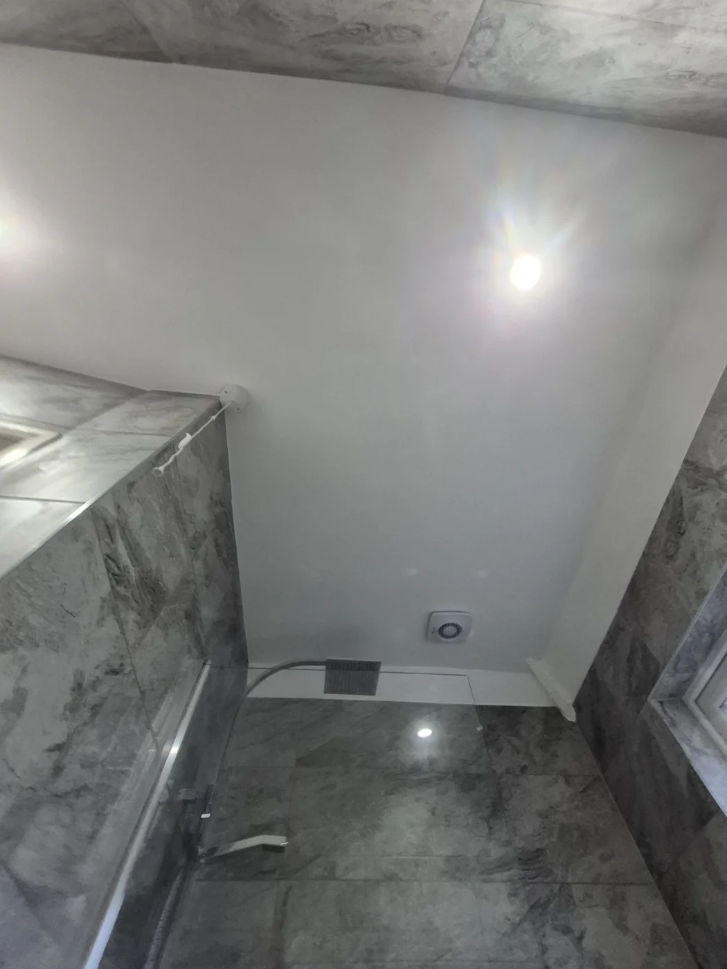 Finished ceiling with recessed lighting and extractor — Queenborough bathroom renovation